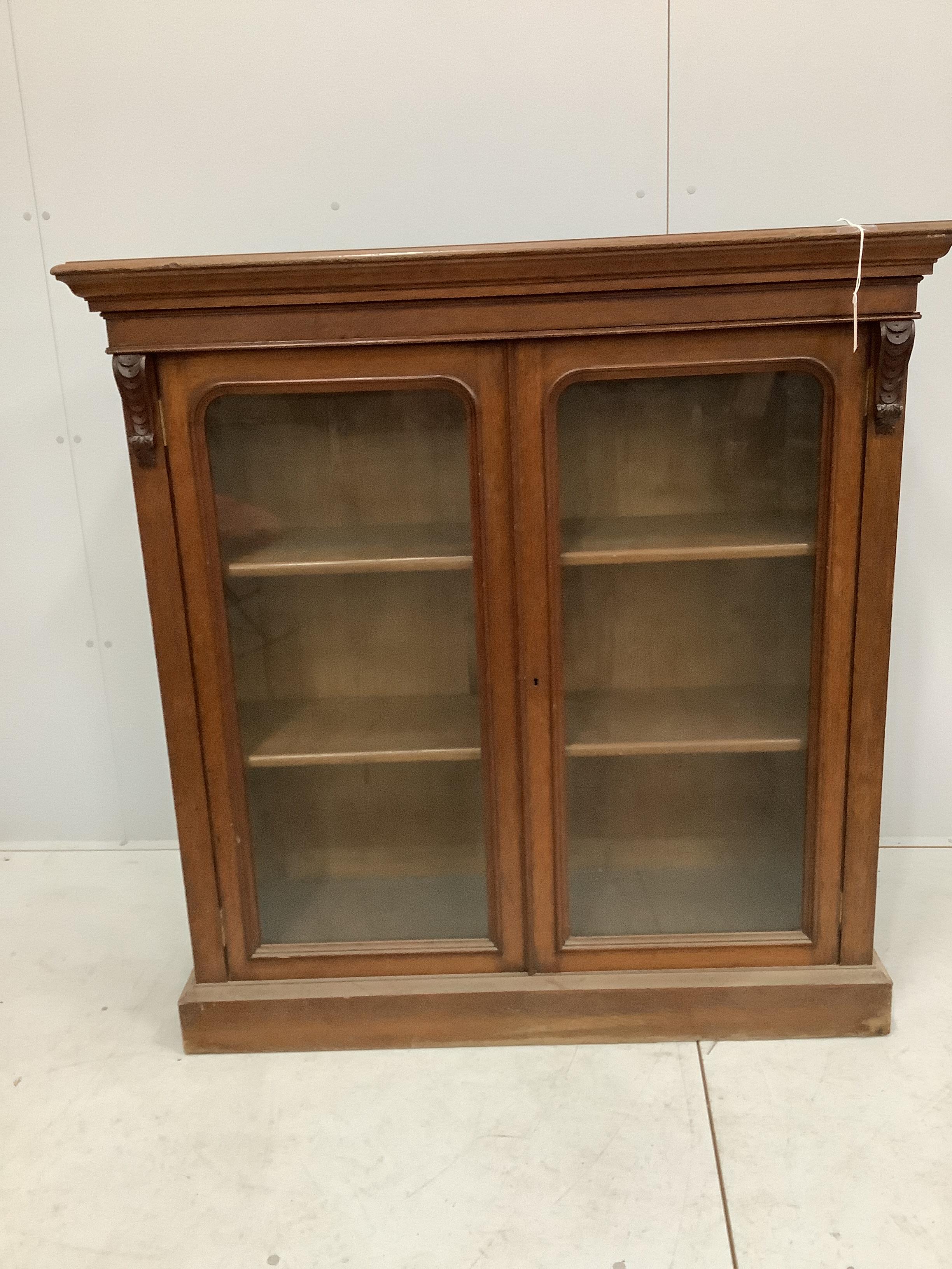 A Victorian glazed oak bookcase, width 118cm, depth 40cm, height 124cm